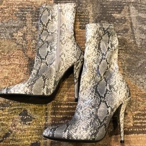 Never worn snake skin heel booties!
